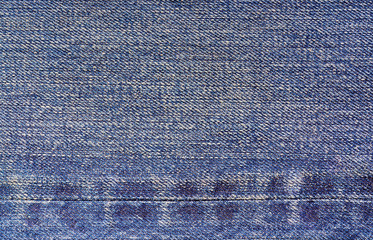 Close up of blue jeans, beautiful retro denim with seam, Top view.