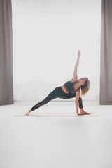 Young woman in Crescent Lunge pose