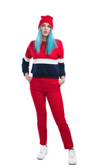 Stylish colorful serious woman with hands in pockets