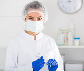 Nurse making injection