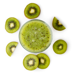 Smoothie in a glass with ripe kiwi on a white. The view from the top.