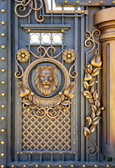 forged doors with a lion