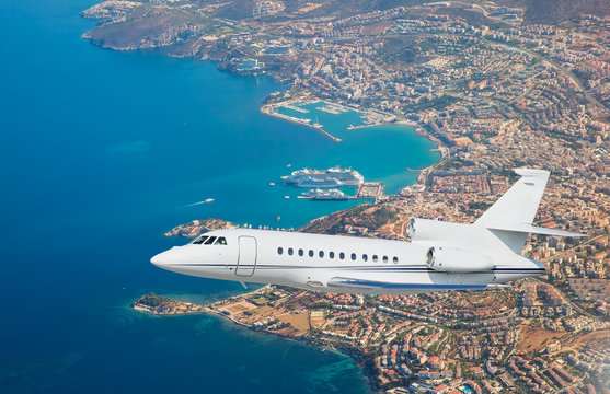 Luxury Design Private Jet Flying Over The City