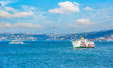 Water trail foaming behind a passenger ferry boat in Bosphorus, Istanbul, Turkey