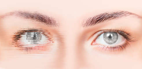 Close-up face of beautiful girl with beautiful grey eyes and big pretty eyelashes