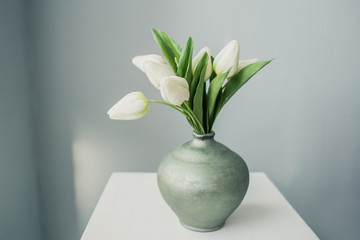 Fresh flowers in a jug for the woman he loved in the early morning