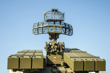 Air defense radar of military mobile mighty rocket launcher system on sky backgroud