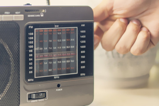 Hand Adjusting The Settings Of Vintage Old Radio, Search For Radio Station Wave F