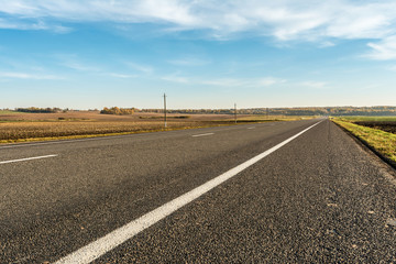 modern asphalt road with road marking elements