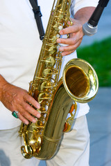 Fototapeta premium Hands on Saxophone