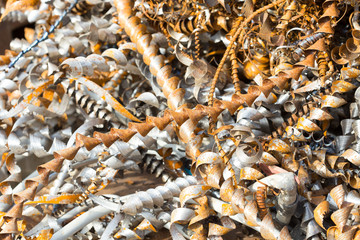 silver spirals of metal shavings as garbage, texture of different size of metal spirals shavings texture, metal shavings texture