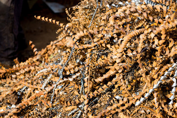 silver spirals of metal shavings as garbage, texture of different size of metal spirals shavings texture, metal shavings texture
