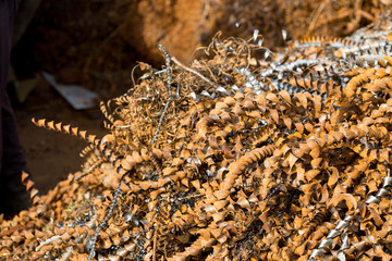 silver spirals of metal shavings as garbage, texture of different size of metal spirals shavings texture, metal shavings texture