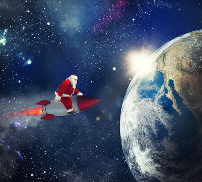 Fast delivery of Christmas gifts with Santa Claus in the space