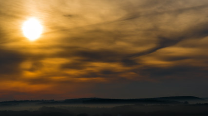 The morning sun at the beginning of an autumn day