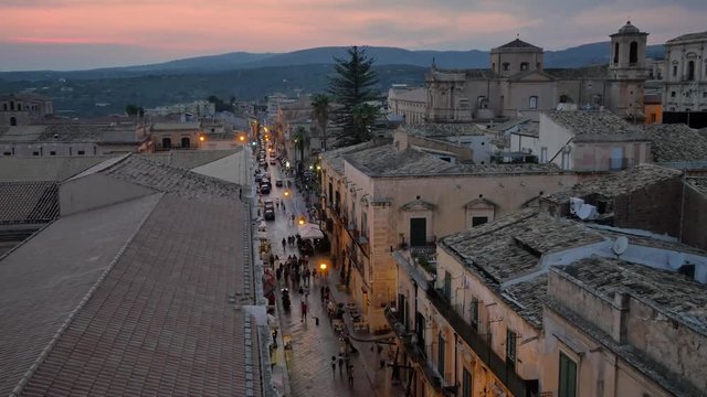 Architecture of Noto, Sicily -  Italy. Evening in the city full of tourists.
