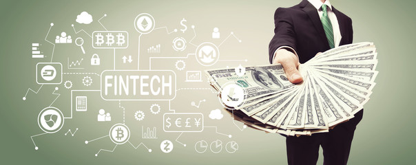 Cryptocurrency fintech theme with business man displaying a spread of cash