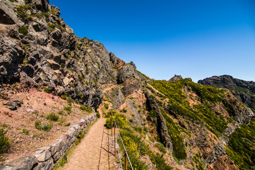 Fototapeta na wymiar View of beautiful mountains Landscape of trek Pico do Arieiro to Pico Ruivo, Madeira island, Portugal