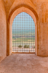 Windows of Kasimiye Madrasah against Mesopotamia - Mardin. Turkey