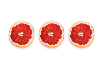 Sliced half of pink grapefruit isolated on white background. Top view