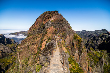 Hiking trail passage from mountain Pico Arieiro to Pico Ruivo, Madeira. Madeira best island destination.