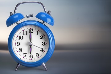 Retro alarm clock on   background