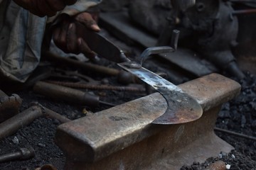 elements of the blacksmith in the streets of Bangladesh