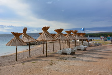 The row of umbrellas under the sea