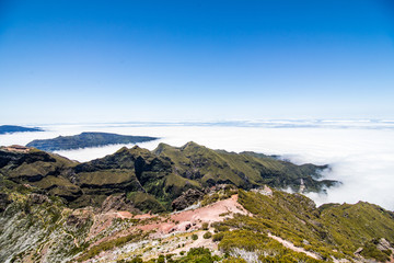 Fototapeta na wymiar Top point of Pico Ruivo view on sky the highest mountain of Madeira island. Madeira best island Europe destination