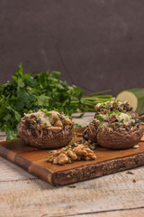 Mushroom caps stuffed with vegetables and cheese