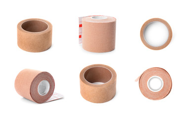 Set with sticking plaster rolls on white background. Medical objects