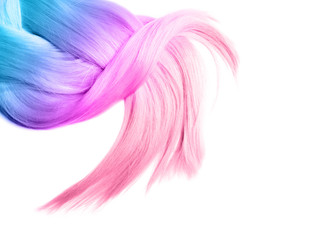 Colorful dyed hair on white background, top view. Trendy hairstyle