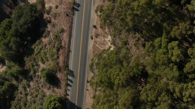 Following back road through the Berkeley hills aerial shot looking down,  Northern California
