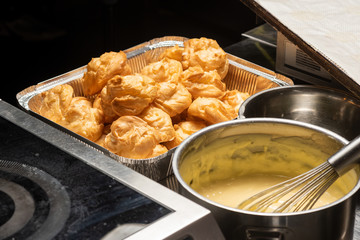 ready creme custard cakes, homemade eclairs from the oven