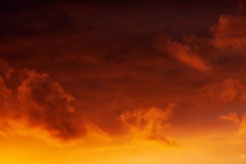Fototapeta na wymiar Fiery red and orange evening sky