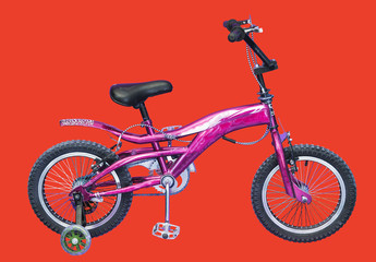 Children's extreme bicycle on a red background