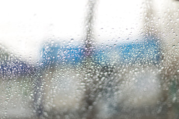Fototapeta na wymiar Raindrops on the windshield