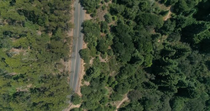 Following back road through the Berkeley hills aerial shot looking down,  Northern California