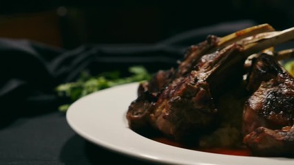 Lamb chops with rice and brussel sprouts.