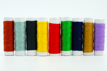 spools of thread isolated on white background