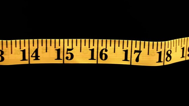 Fabric Measuring Tape In Yellow High-Res Stock Photo - Getty Images