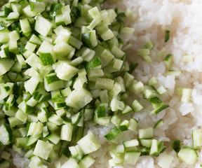 Boiled rice and cucumber slices