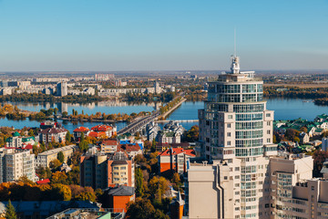 Obraz premium Sunny golden autumn Voronezh. Aerial view from skyscraper roof height 