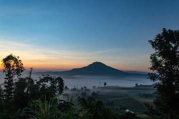 Fog and sun Morning after mountain.