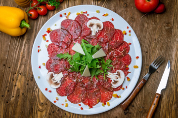 Beef carpaccio with Parmesan and arugula