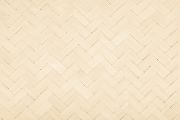 Brown Mat Traditional handicraft bamboo weave texture background. Wicker surface pattern material for wall with antique cracking furniture painted weathered white vintage peeling wallpaper or board.