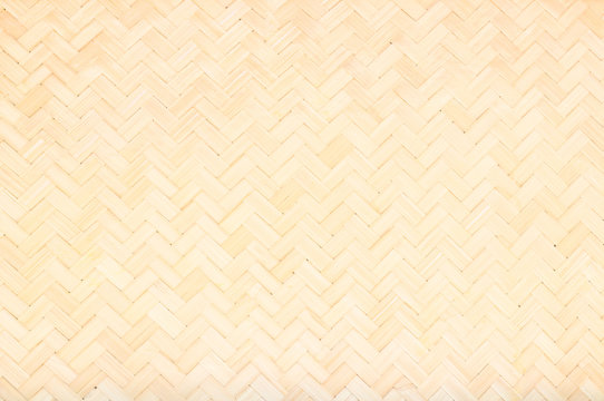 Brown Mat Traditional Handicraft Bamboo Weave Texture Background. Wicker Surface Pattern Material For Wall With Antique Cracking Furniture Painted Weathered White Vintage Peeling Wallpaper Or Board.