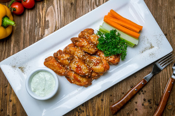 Chicken wings with blue cheese sauce