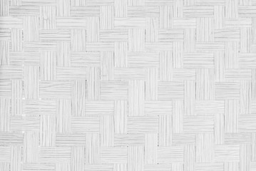 Gray Mat Traditional handicraft bamboo weave texture background. Wicker surface pattern material for wall with antique cracking furniture painted weathered white vintage peeling wallpaper or board.