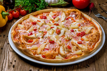 pizza Hawaiian with pineapple and chicken